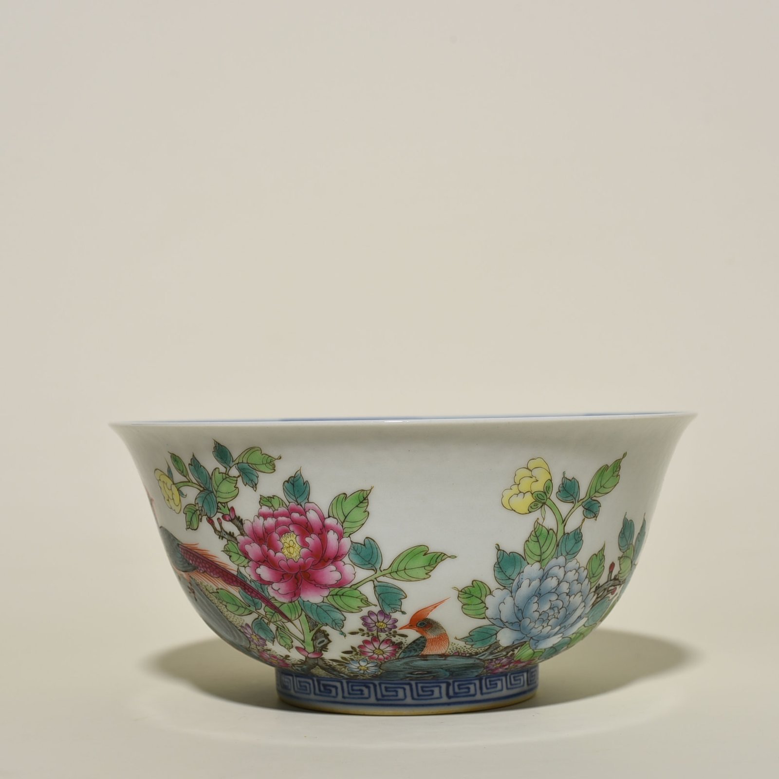 Qing Dynasty Qianlong blue and white pastel golden pheasant peony pattern bowl