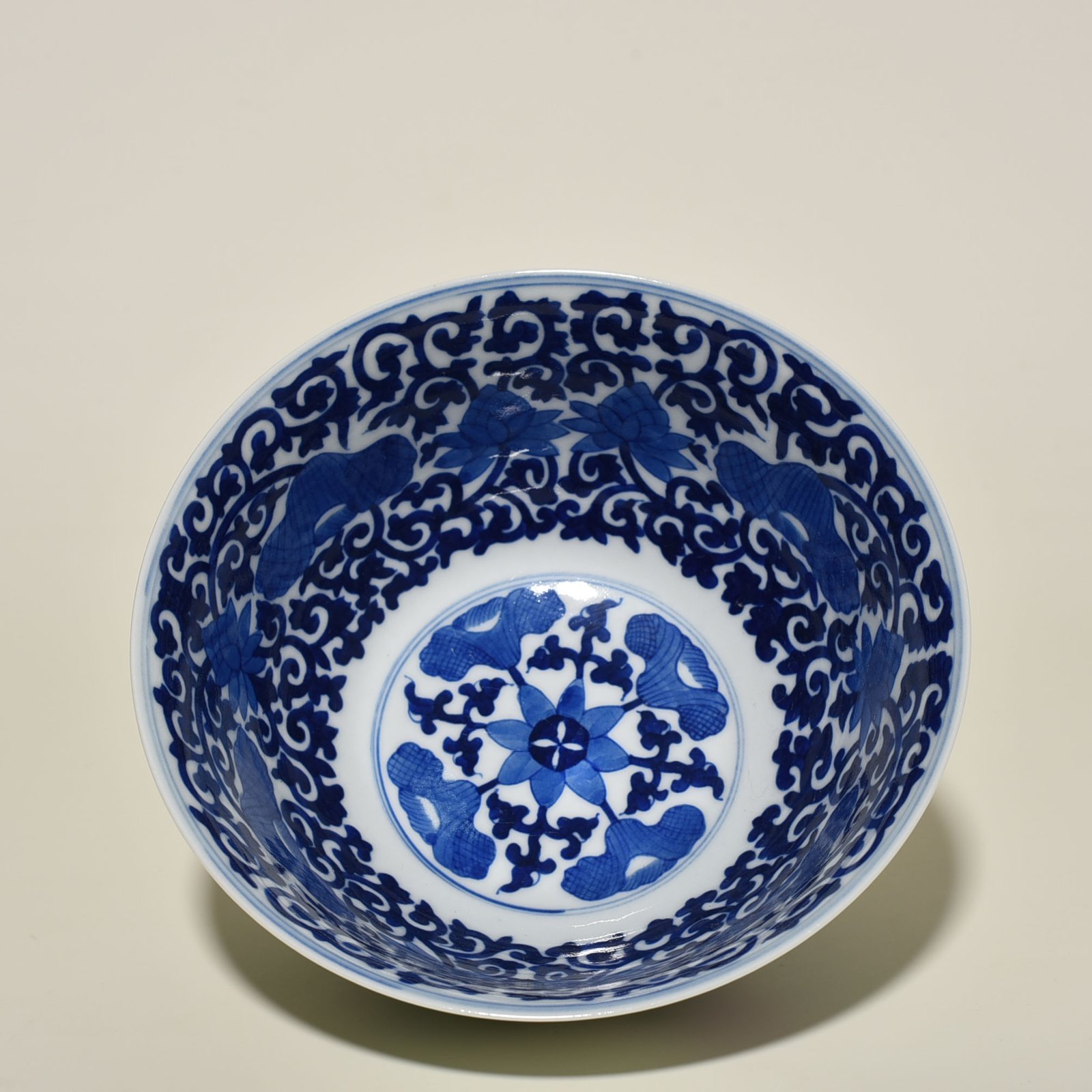 Qing Dynasty Qianlong blue and white pastel golden pheasant peony pattern bowl