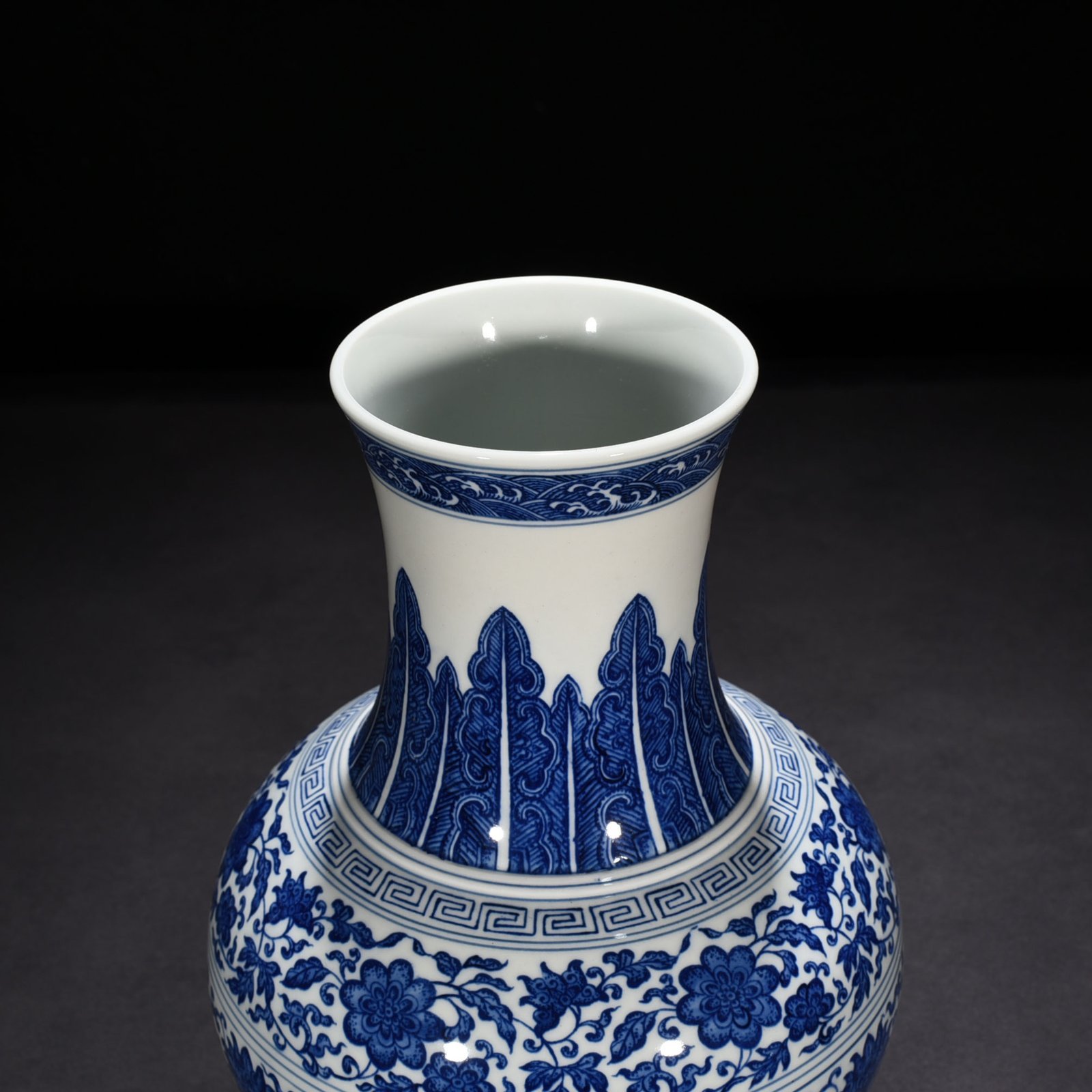 Qing Dynasty Qianlong blue and white vase with intertwining branches