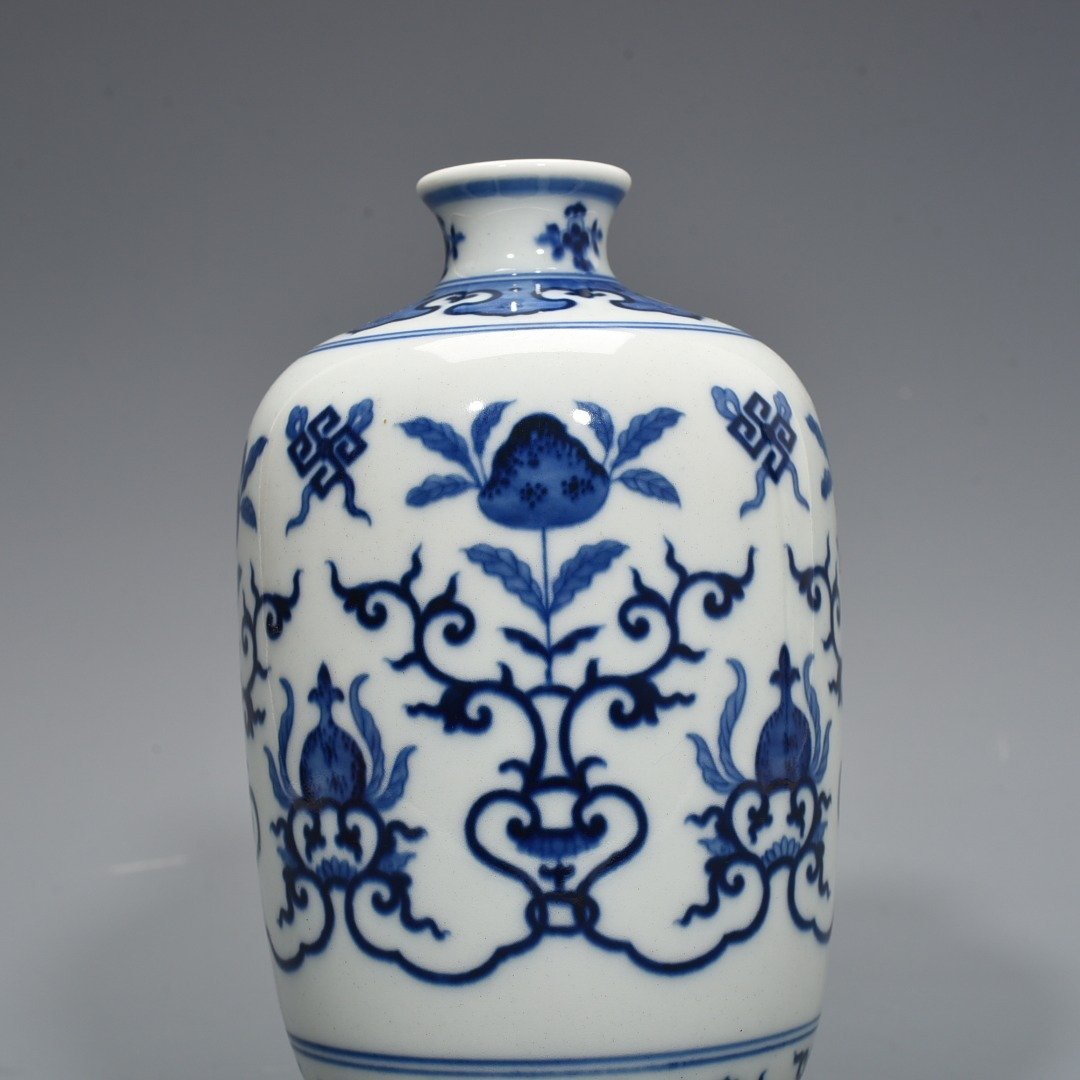 Qing Dynasty Qianlong blue and white plum vase