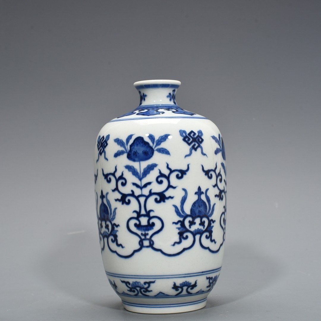 Qing Dynasty Qianlong blue and white plum vase