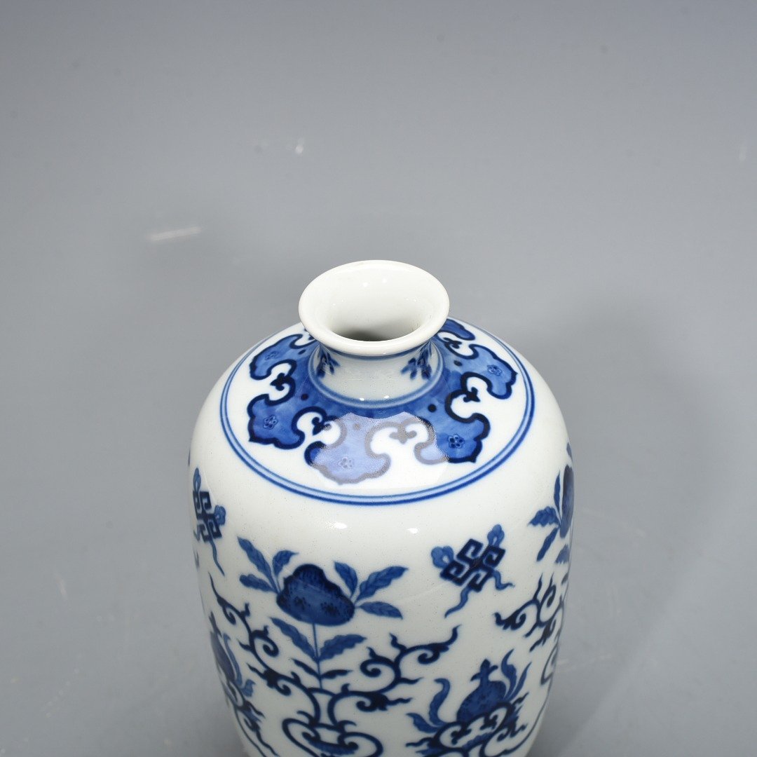 Qing Dynasty Qianlong blue and white plum vase