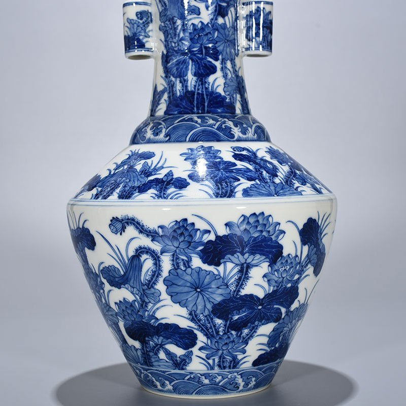 Qing Dynasty Qianlong blue and white lotus pattern through-ear vase