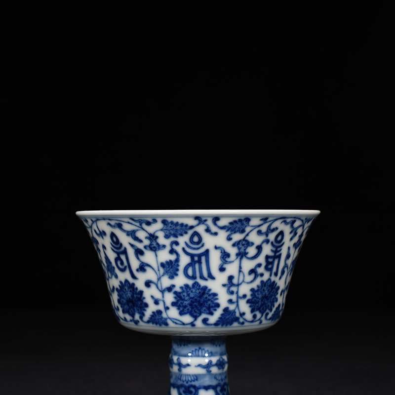 Qing Dynasty Qianlong blue and white lotus holder with Sanskrit goblet