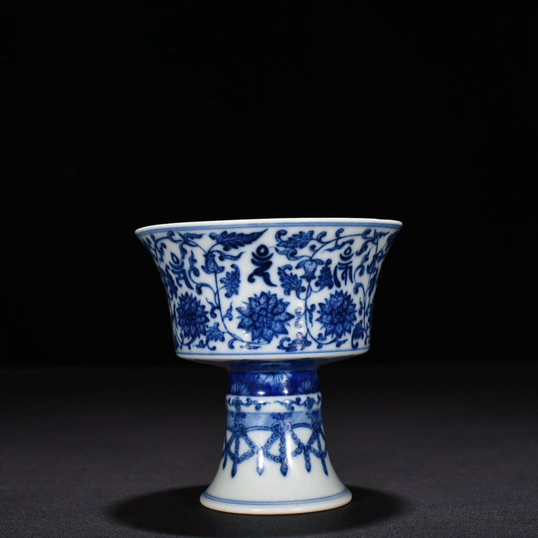 Qing Dynasty Qianlong blue and white lotus holder with Sanskrit goblet