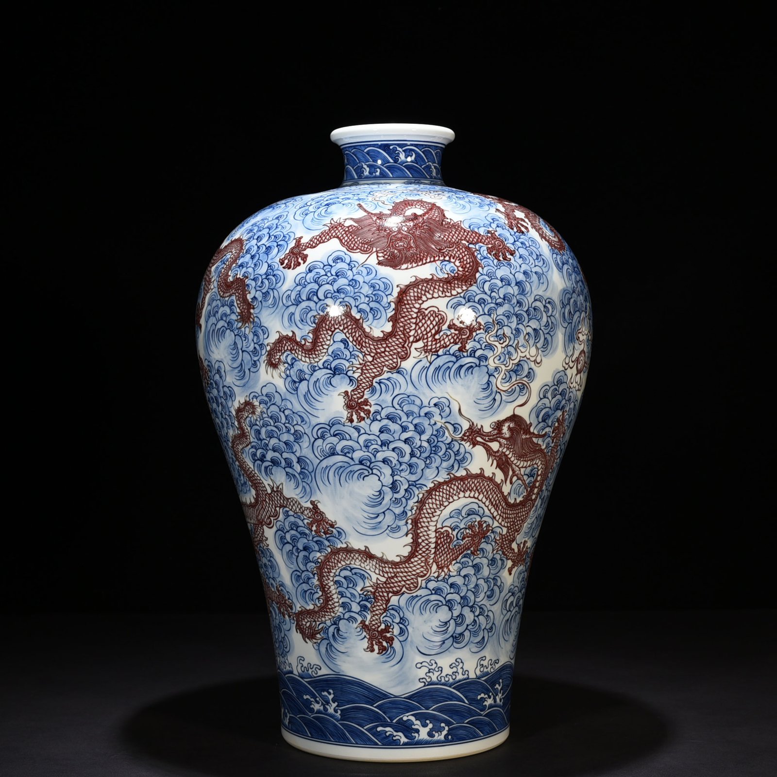 Qing Dynasty Qianlong blue and white underglaze red nine-dragon pattern plum vase