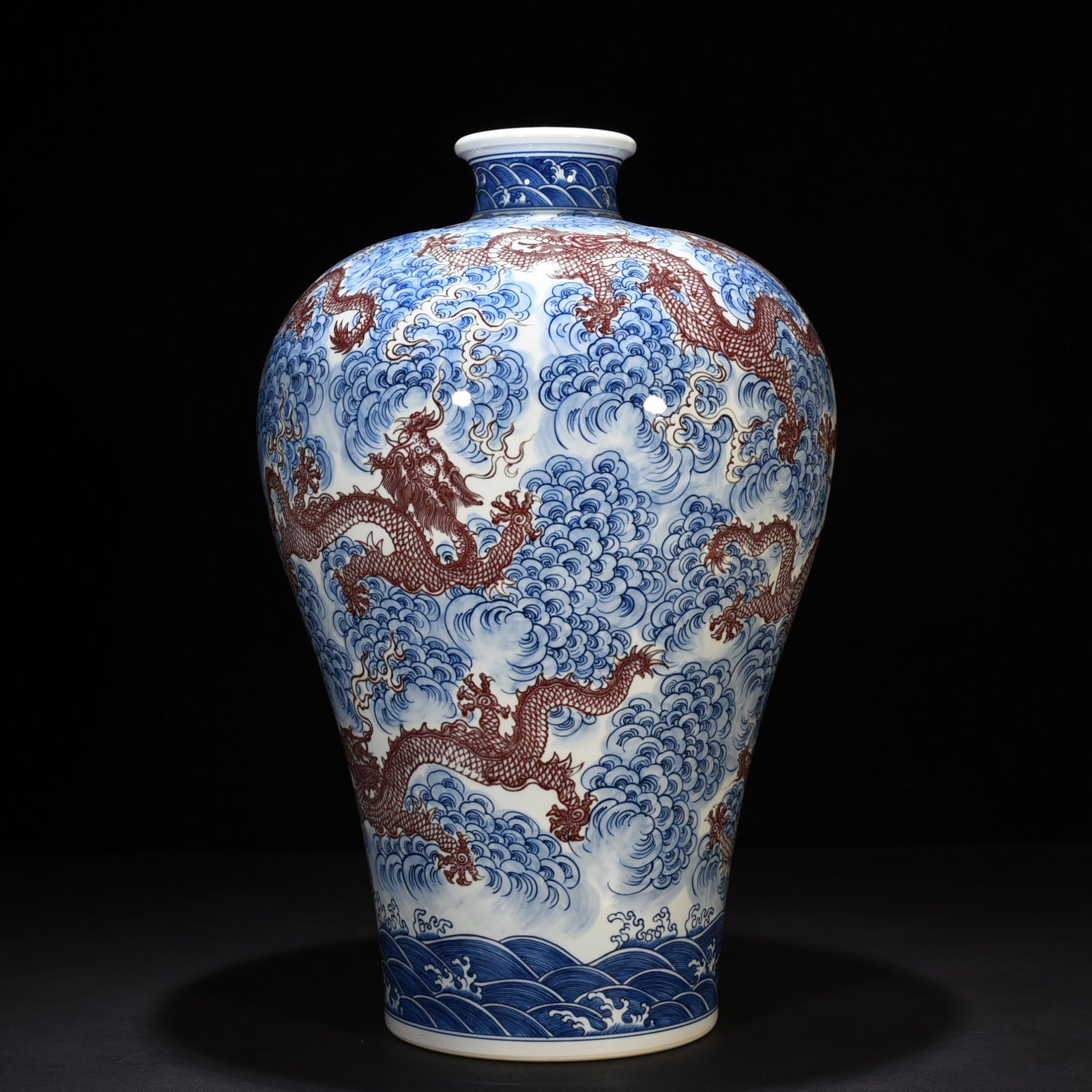 Qing Dynasty Qianlong blue and white underglaze red nine-dragon pattern plum vase