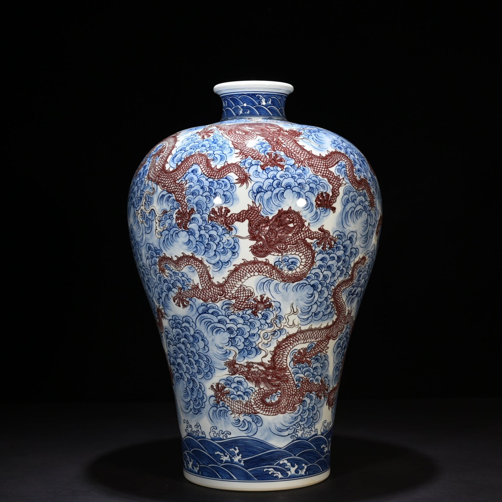 Qing Dynasty Qianlong blue and white underglaze red nine-dragon pattern plum vase