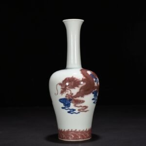 Qing Dynasty Qianlong blue and white underglaze red cloud and dragon pattern rattle vase