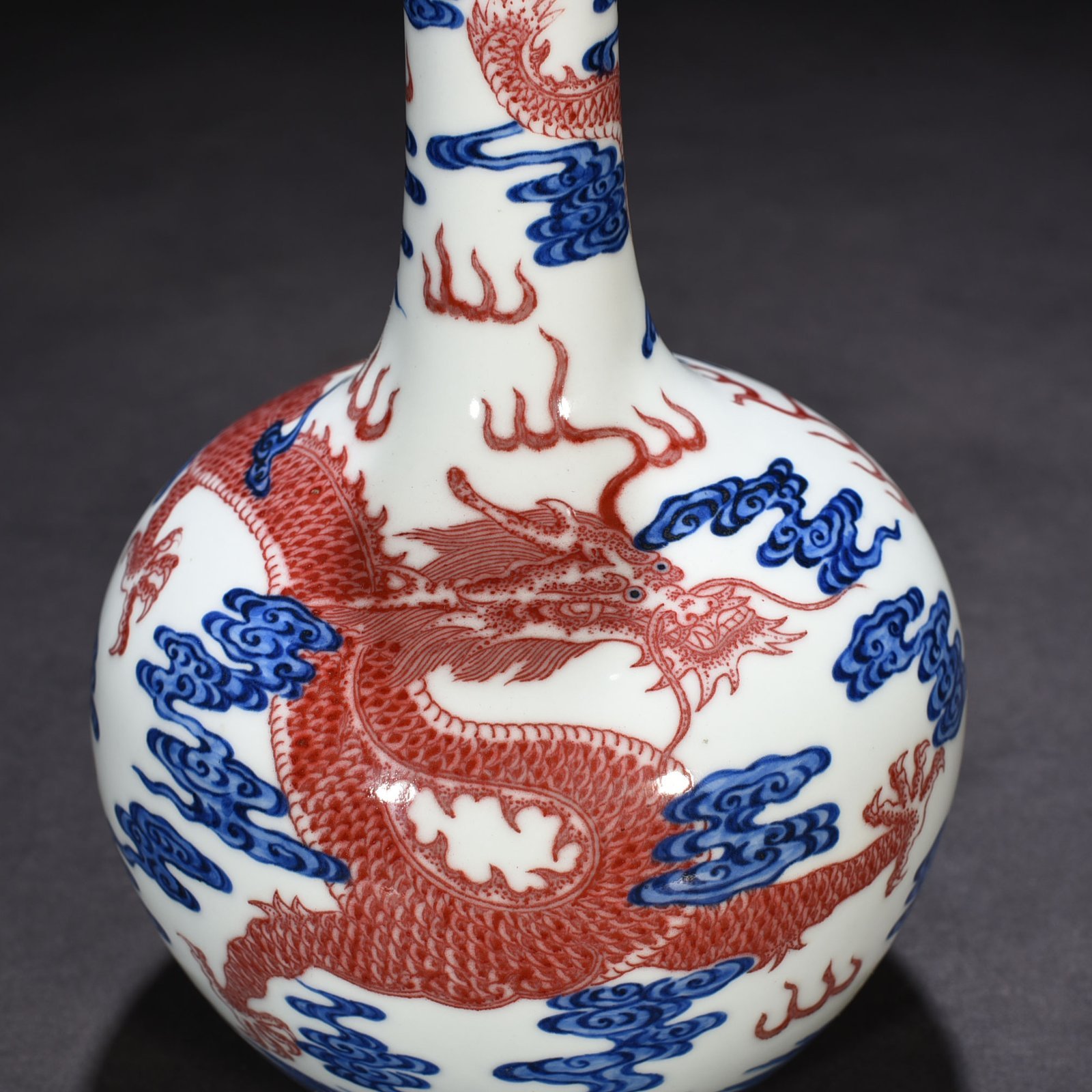 Qing Dynasty Qianlong blue and white underglaze red sea dragon pattern celestial sphere vase