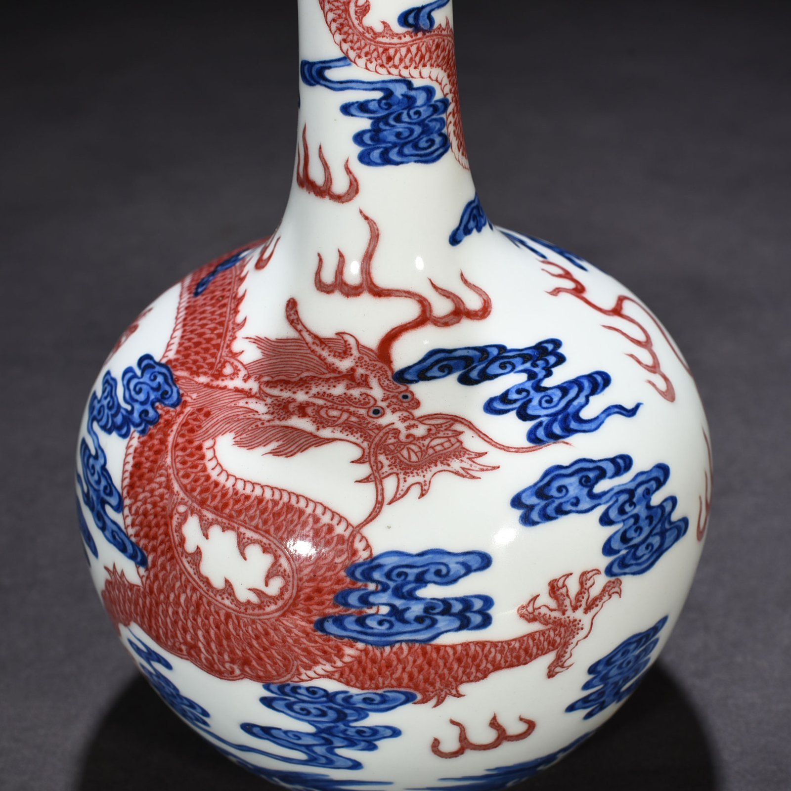 Qing Dynasty Qianlong blue and white underglaze red sea dragon pattern celestial sphere vase