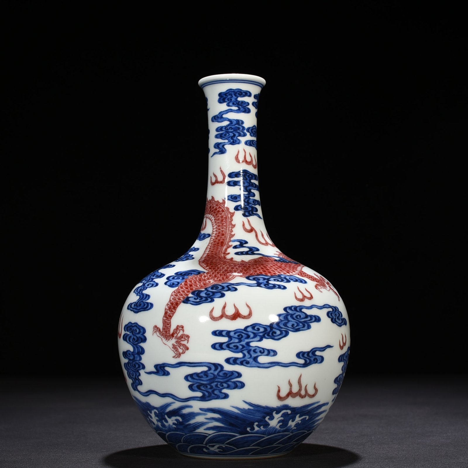 Qing Dynasty Qianlong blue and white underglaze red sea dragon pattern celestial sphere vase