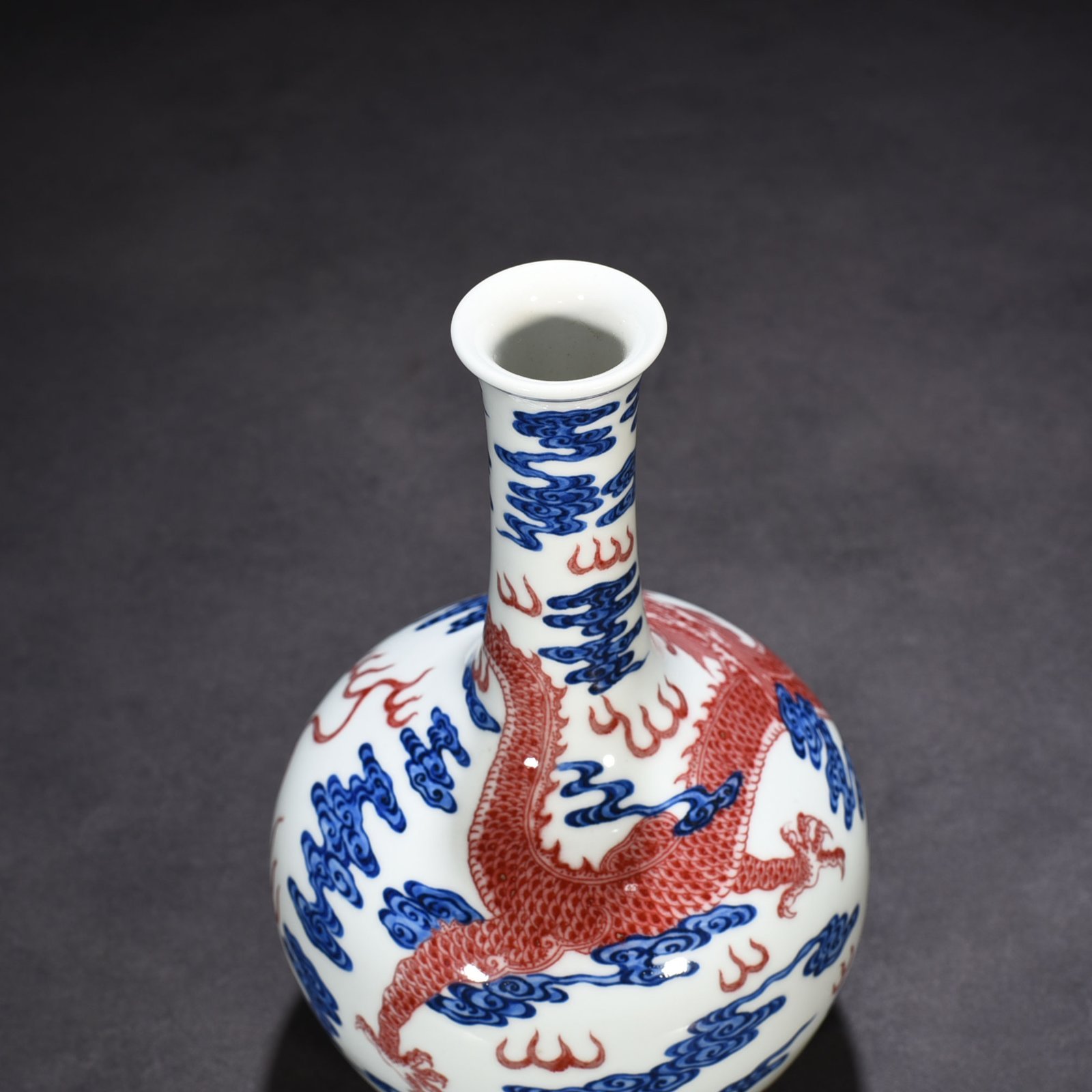 Qing Dynasty Qianlong blue and white underglaze red sea dragon pattern celestial sphere vase