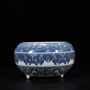 Qing Dynasty Qianlong blue and white Taotie animal mask pattern three-legged wash