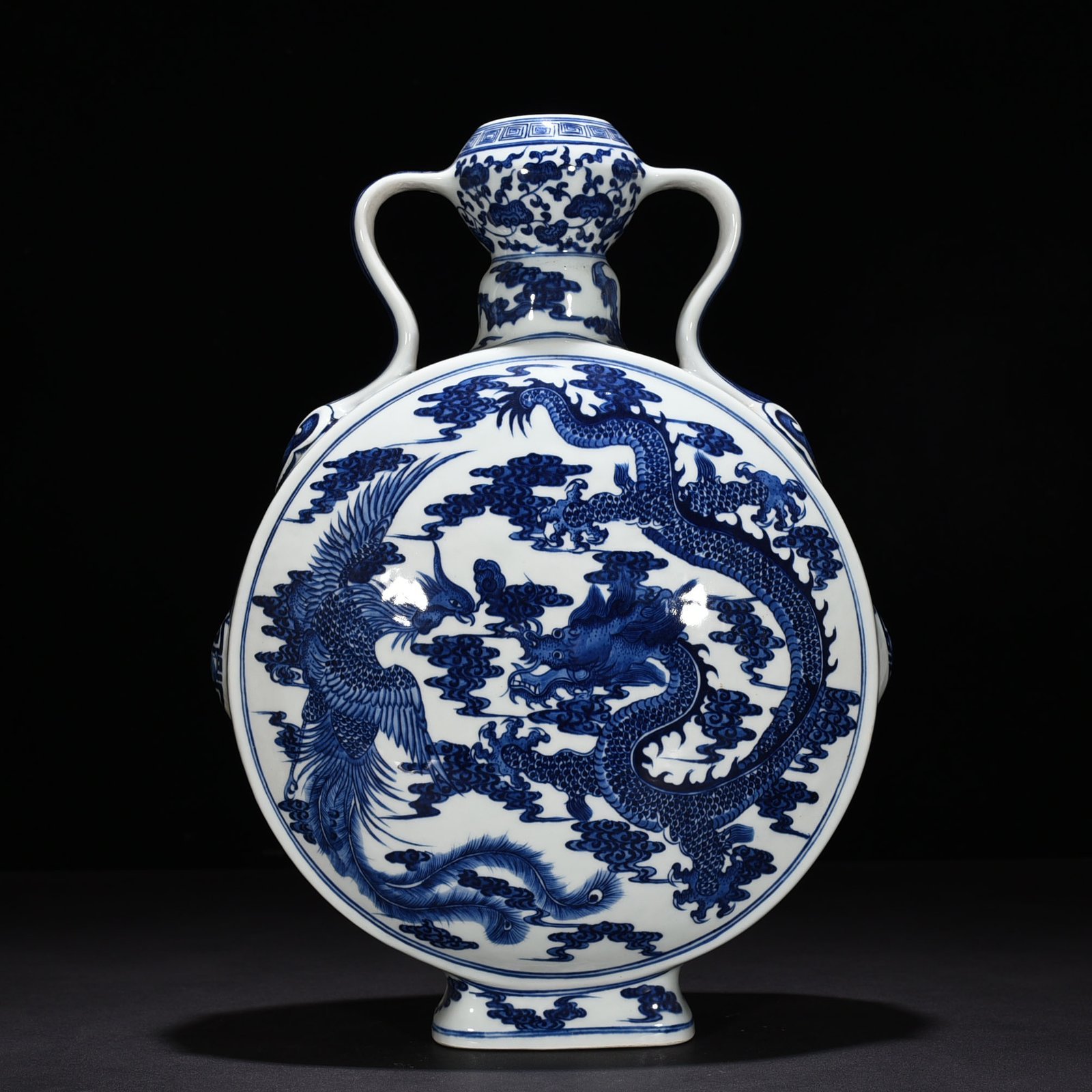 Qing Dynasty Qianlong blue and white dragon and phoenix pattern moon vase