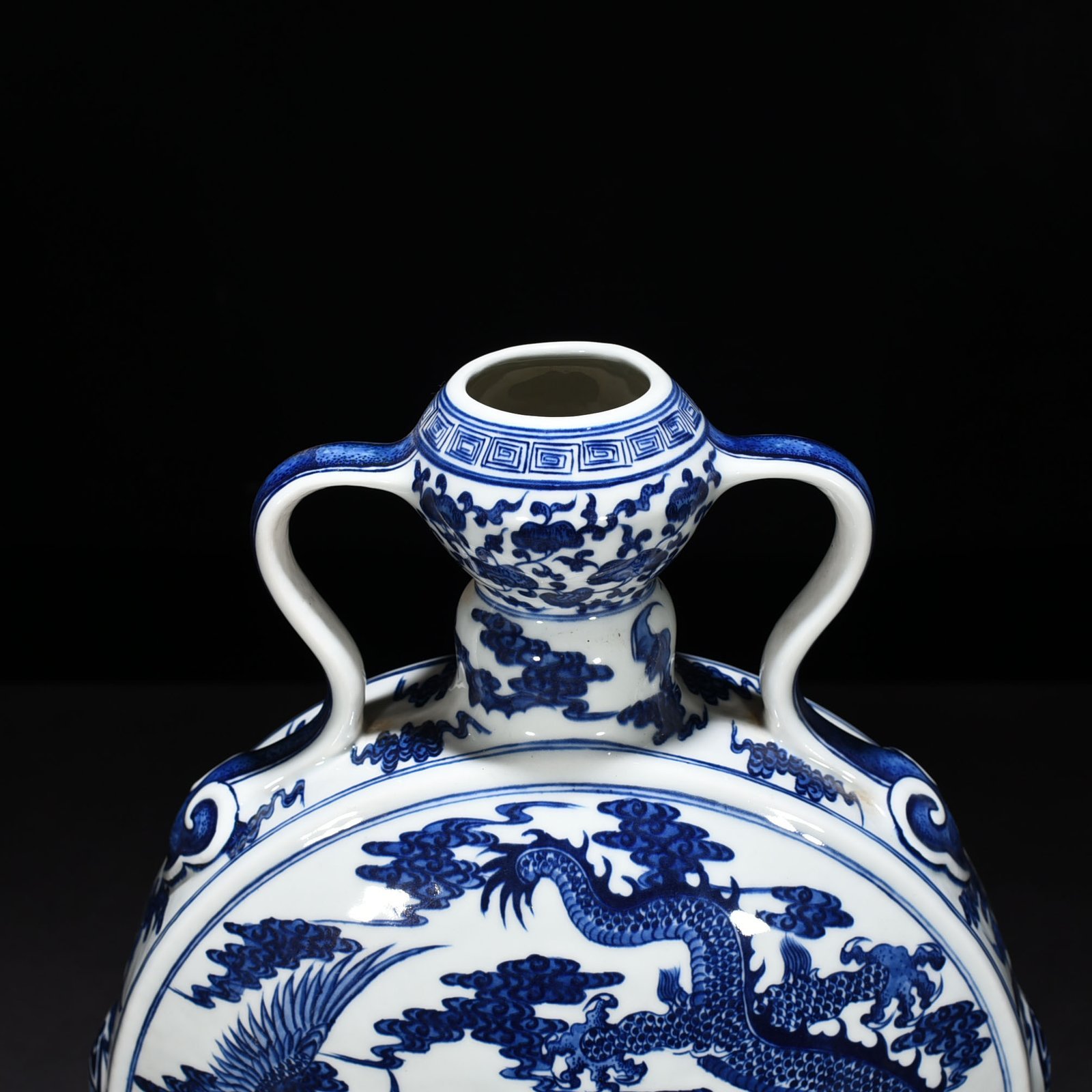 Qing Dynasty Qianlong blue and white dragon and phoenix pattern moon vase