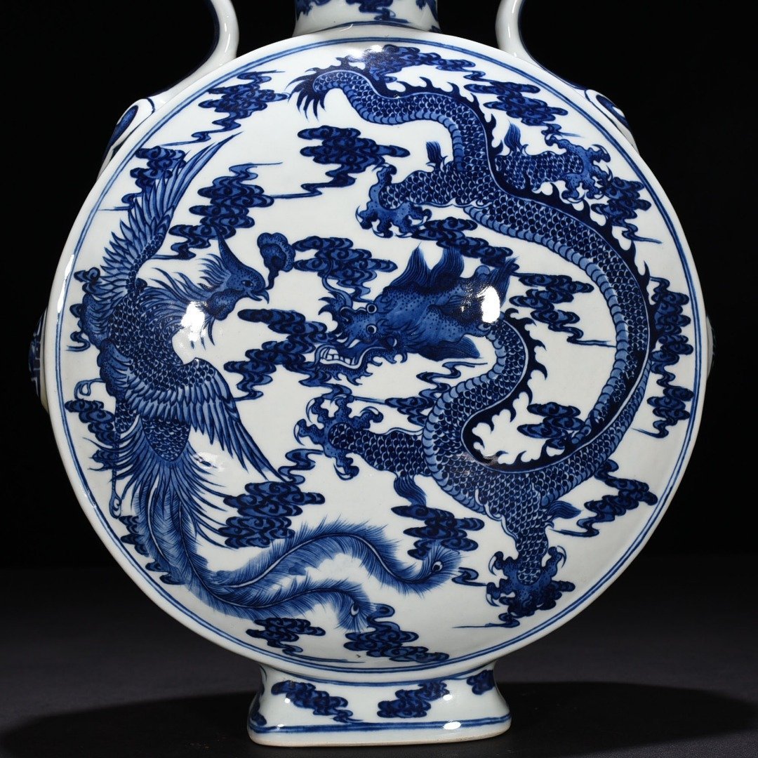 Qing Dynasty Qianlong blue and white dragon and phoenix pattern moon vase