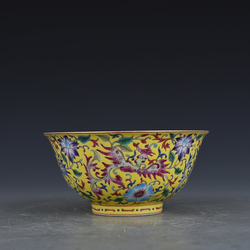 Qing Dynasty Qianlong yellow ground enamel phoenix flower pattern bowl