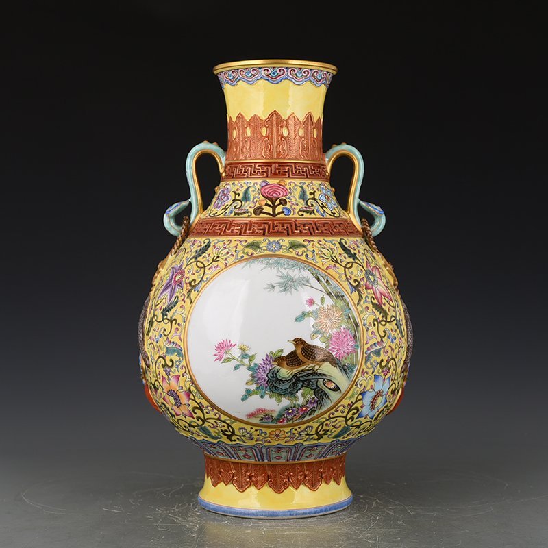 Qing Dynasty Qianlong yellow ground enamel consecrated flower and bird Ruyi ear vase