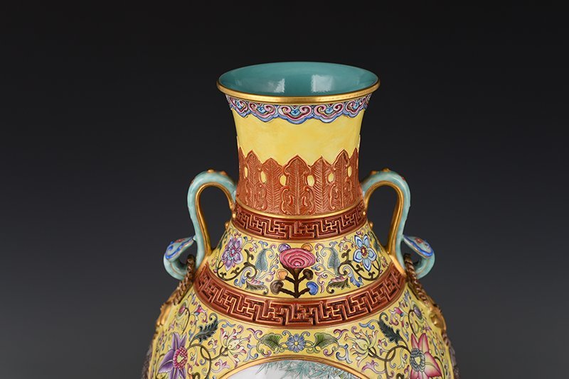Qing Dynasty Qianlong yellow ground enamel consecrated flower and bird Ruyi ear vase