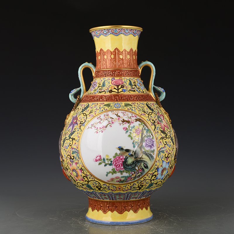 Qing Dynasty Qianlong yellow ground enamel consecrated flower and bird Ruyi ear vase