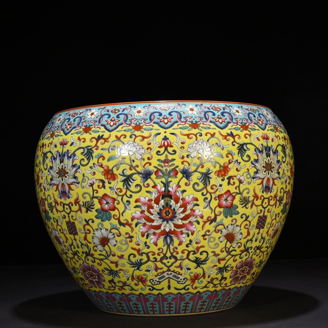 Qing Dynasty Qianlong yellow ground enamel scroll vat with entwining branches and floral patterns
