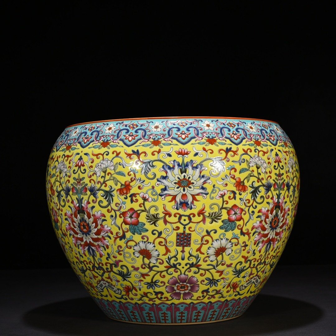 Qing Dynasty Qianlong yellow ground enamel scroll vat with entwining branches and floral patterns