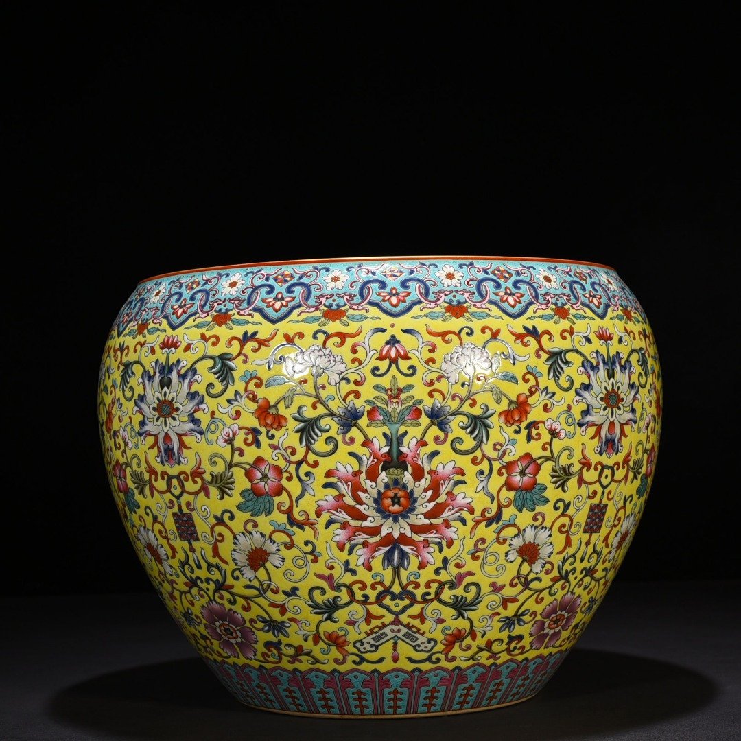Qing Dynasty Qianlong yellow ground enamel scroll vat with entwining branches and floral patterns
