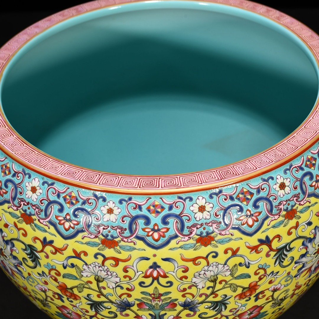 Qing Dynasty Qianlong yellow ground enamel scroll vat with entwining branches and floral patterns