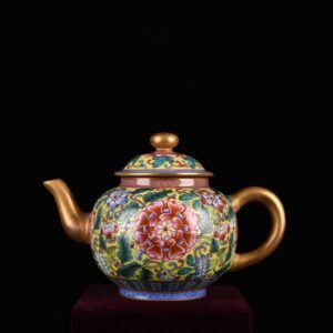 Qing Dynasty Qianlong yellow ground enamel pot with lotus pattern