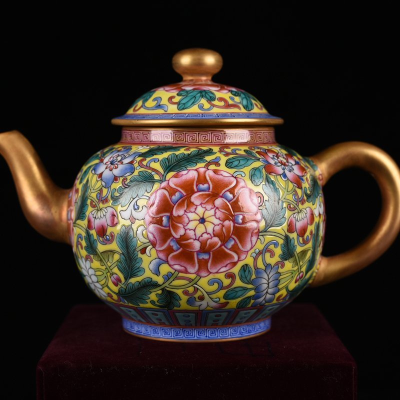 Qing Dynasty Qianlong yellow ground enamel pot with lotus pattern
