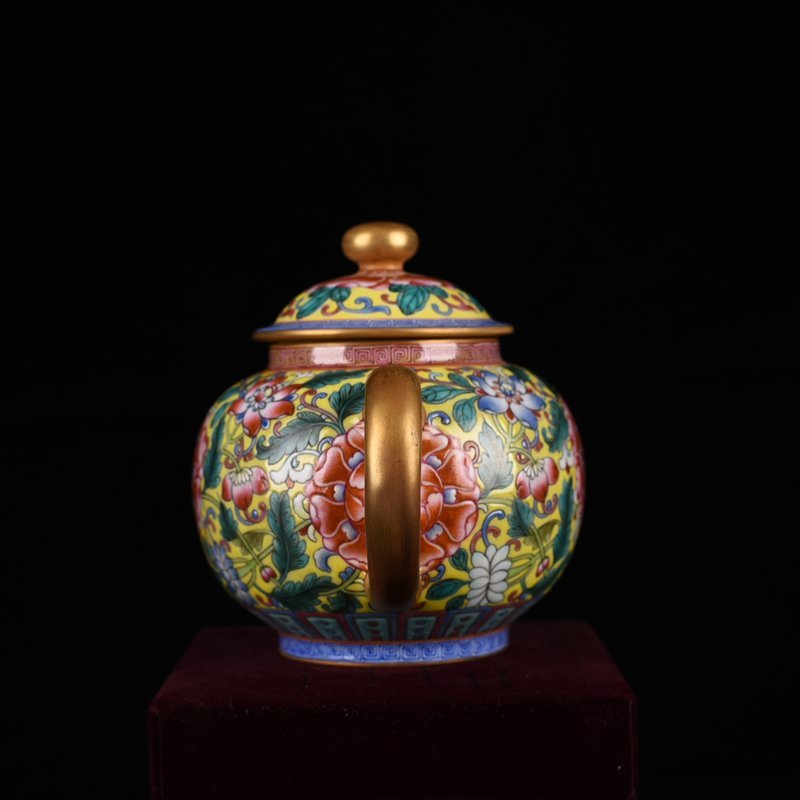Qing Dynasty Qianlong yellow ground enamel pot with lotus pattern