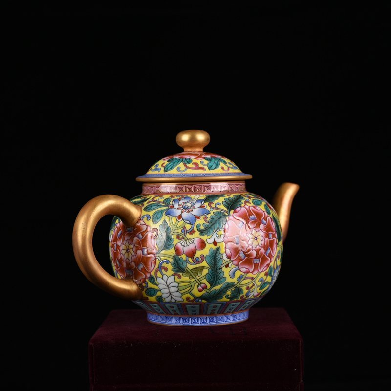 Qing Dynasty Qianlong yellow ground enamel pot with lotus pattern