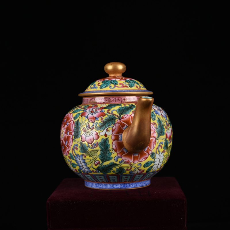 Qing Dynasty Qianlong yellow ground enamel pot with lotus pattern