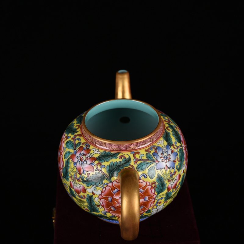 Qing Dynasty Qianlong yellow ground enamel pot with lotus pattern