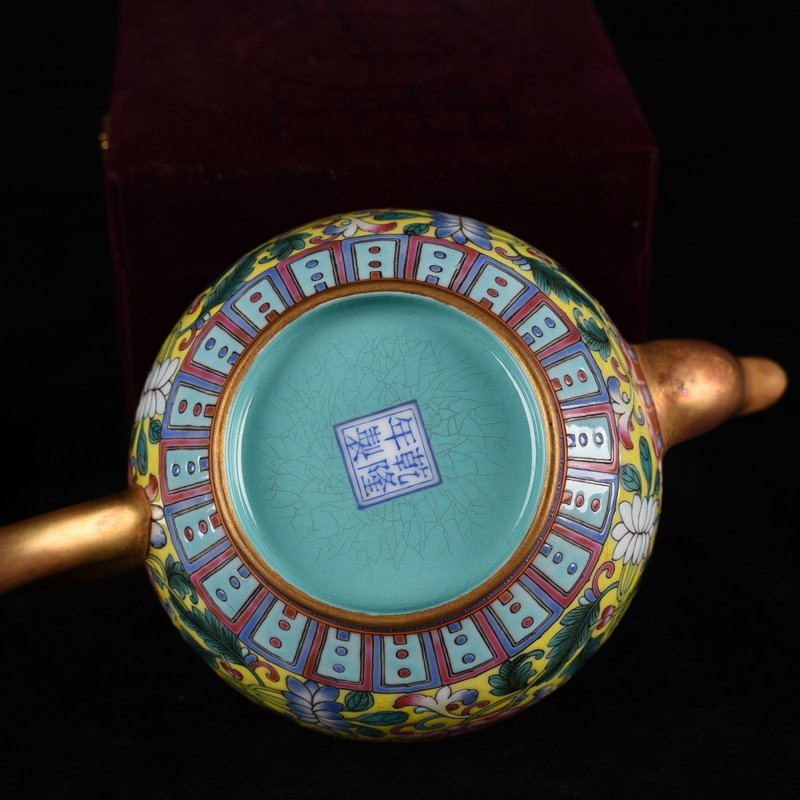 Qing Dynasty Qianlong yellow ground enamel pot with lotus pattern