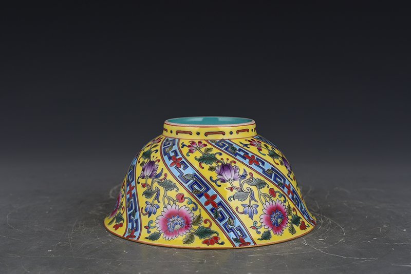Qing Dynasty Qianlong yellow ground enamel flower pattern bowl