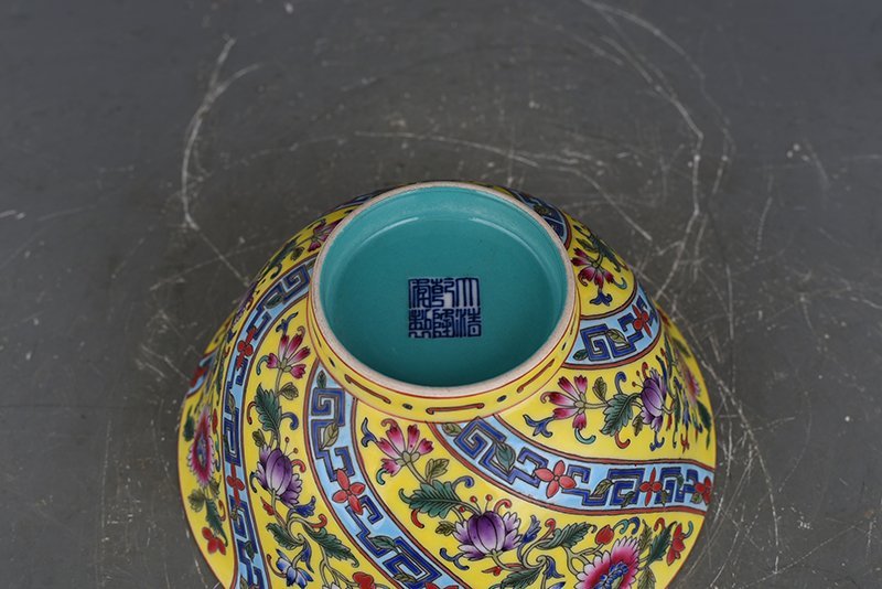 Qing Dynasty Qianlong yellow ground enamel flower pattern bowl