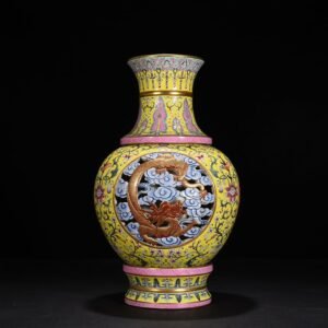 Qing Dynasty Qianlong yellow ground enamel hollow cloud and dragon pattern revolving vase
