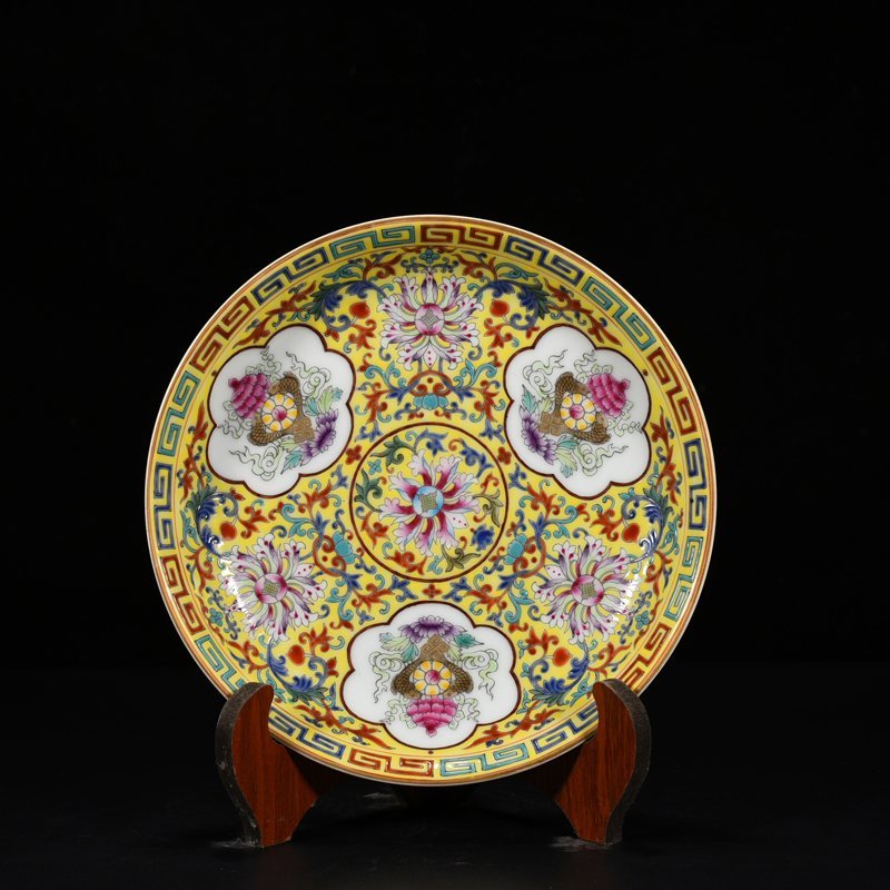 Qing Dynasty Qianlong yellow ground pastel eight-treasure flower pattern plate