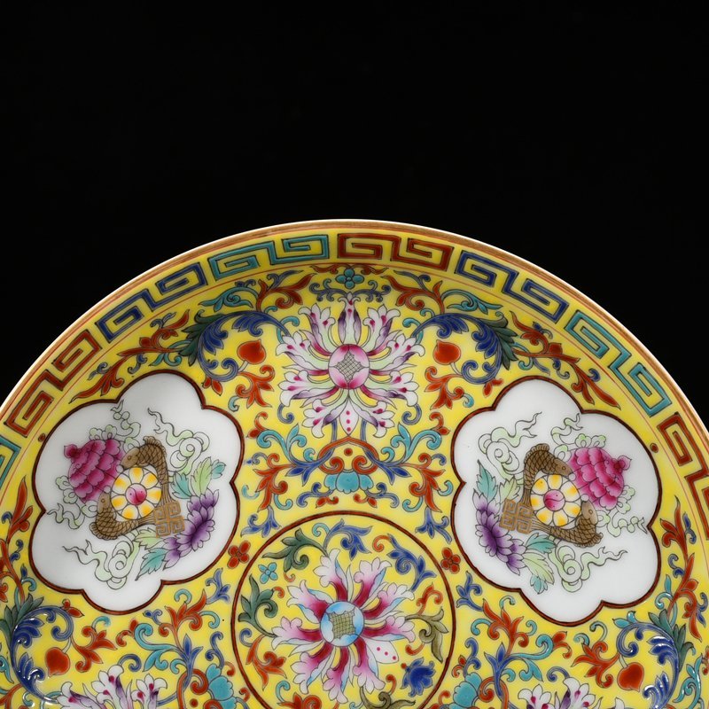 Qing Dynasty Qianlong yellow ground pastel eight-treasure flower pattern plate