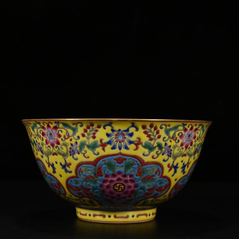 Qing Dynasty Qianlong yellow ground pastel consecrated bowl with floral pattern