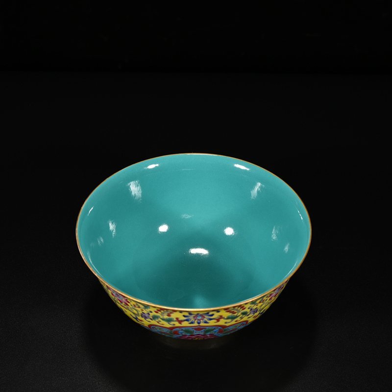 Qing Dynasty Qianlong yellow ground pastel consecrated bowl with floral pattern