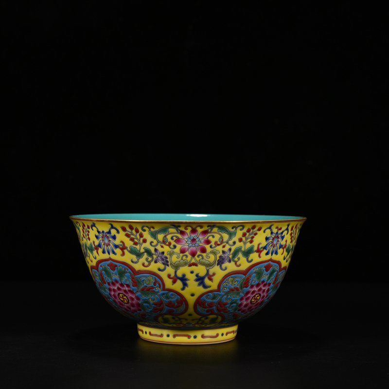 Qing Dynasty Qianlong yellow ground pastel consecrated bowl with floral pattern