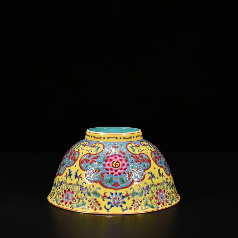 Qing Dynasty Qianlong yellow ground pastel consecrated bowl with floral pattern