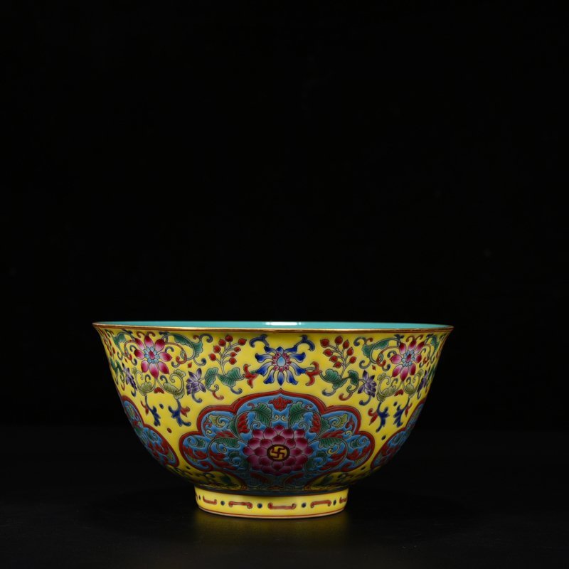 Qing Dynasty Qianlong yellow ground pastel consecrated bowl with floral pattern