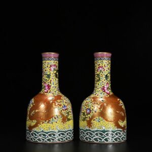 Qing Dynasty Qianlong yellow ground pastel gold dragon pattern rattle