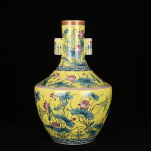 Qing Dynasty Qianlong yellow ground pastel lotus through-ear vase