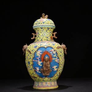 Qing Dynasty Qianlong yellow ground pastel carved Guanyin double-eared statue