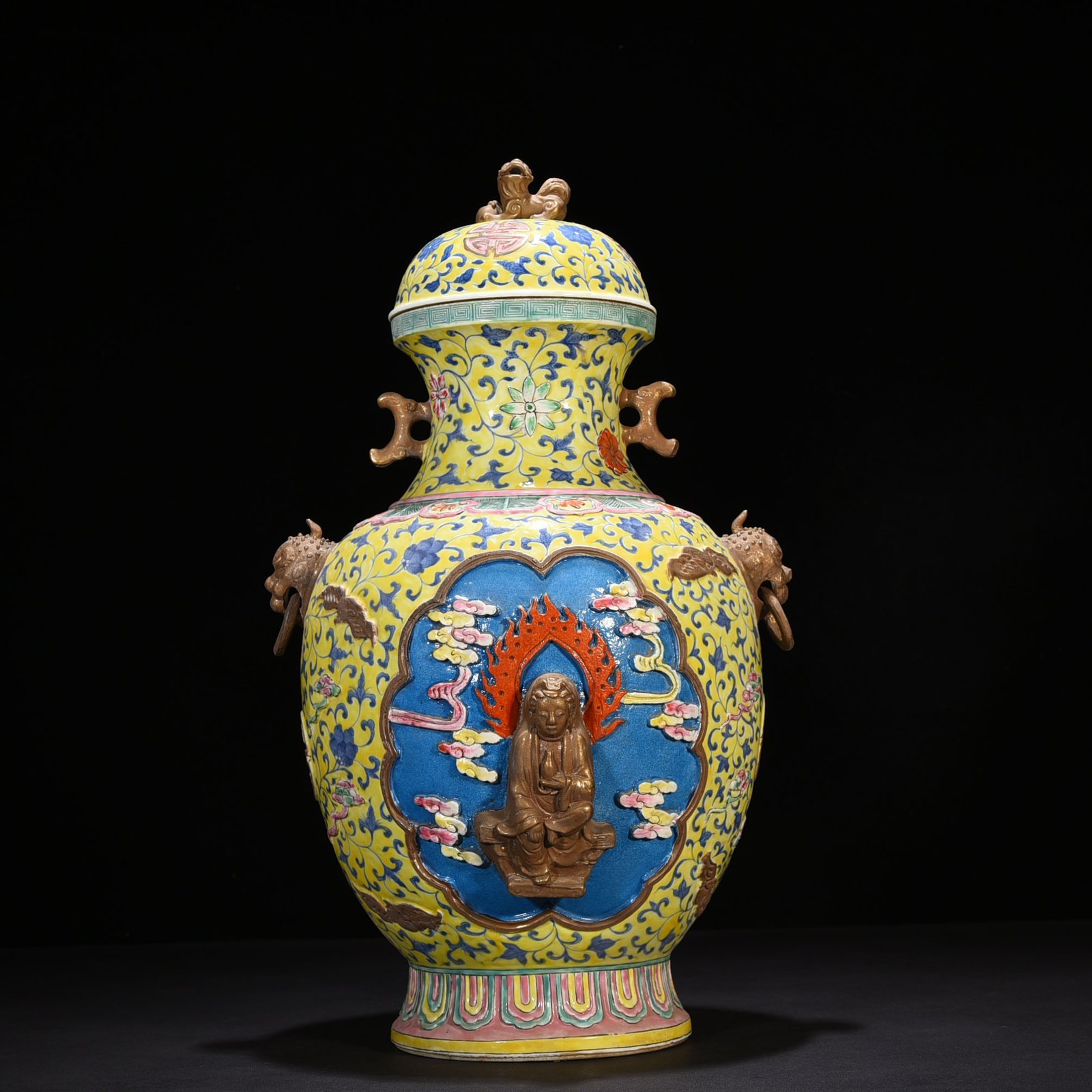Qing Dynasty Qianlong yellow ground pastel carved Guanyin double-eared statue